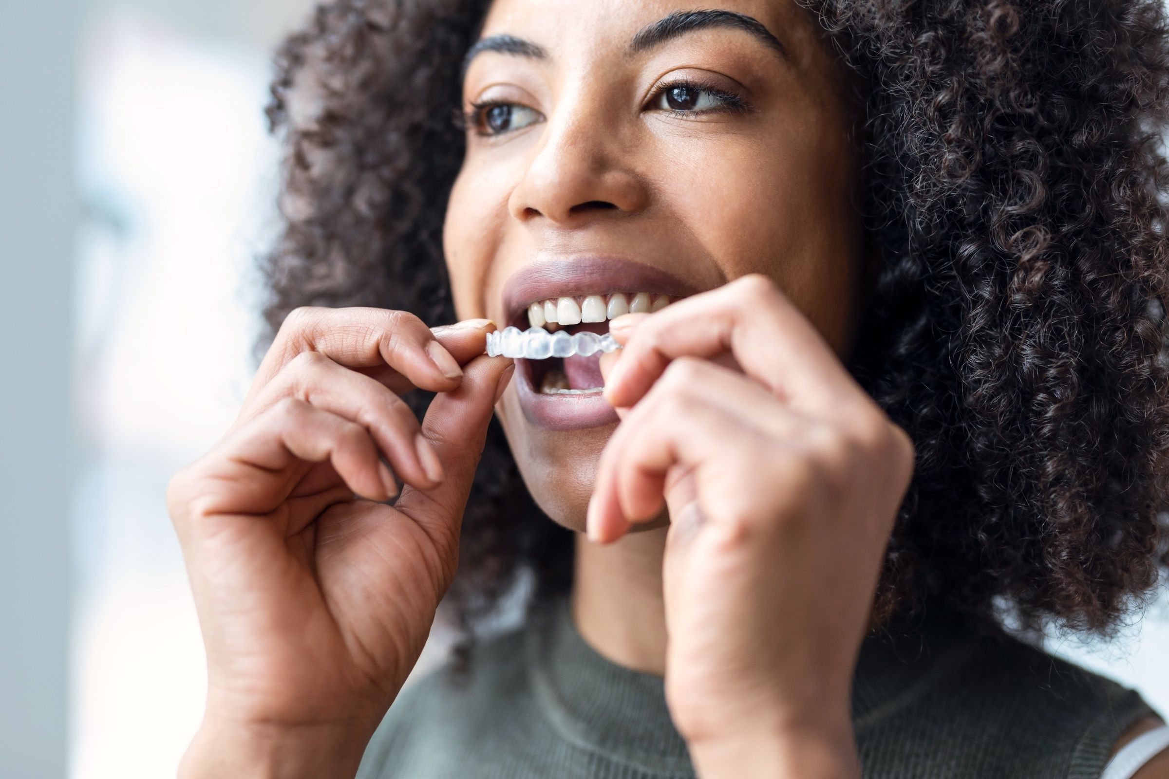 Patient fitting a clear aligner